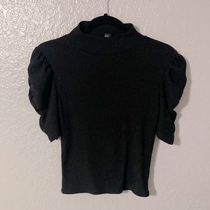 All black very stretchy top from forever 21 with ruffled arm sleeves